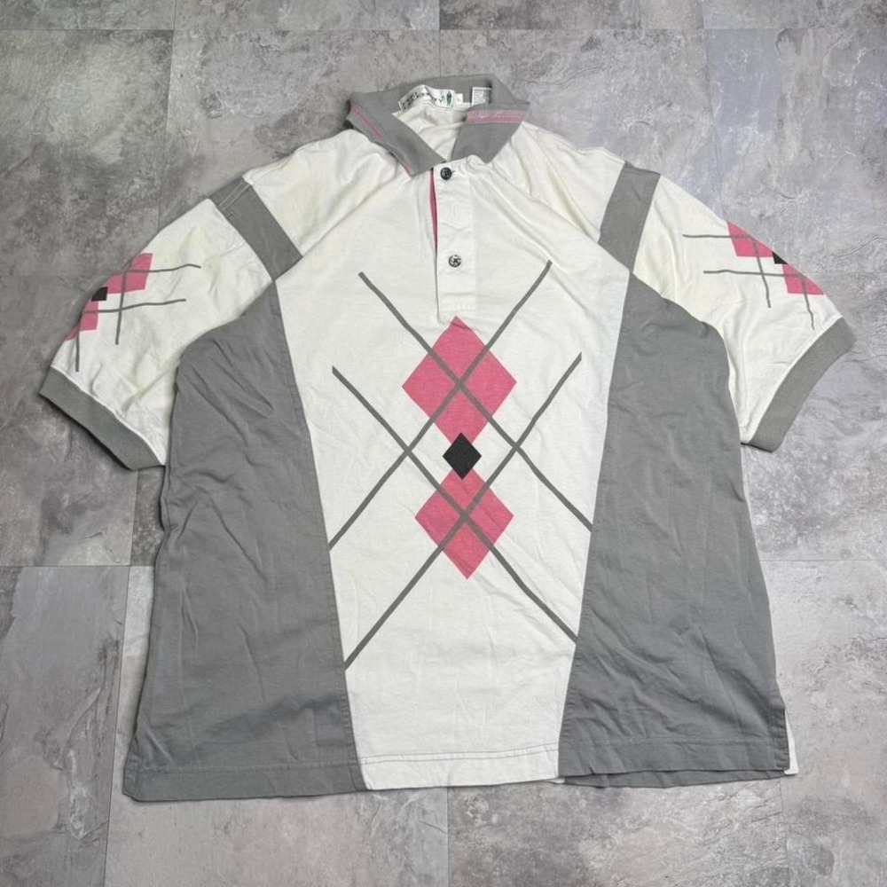 Pro Celebrity pink and white polo shirt